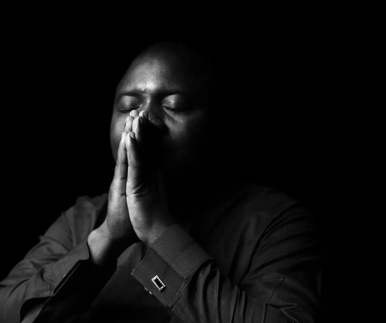 grayscale photo of man wearing dress shirt